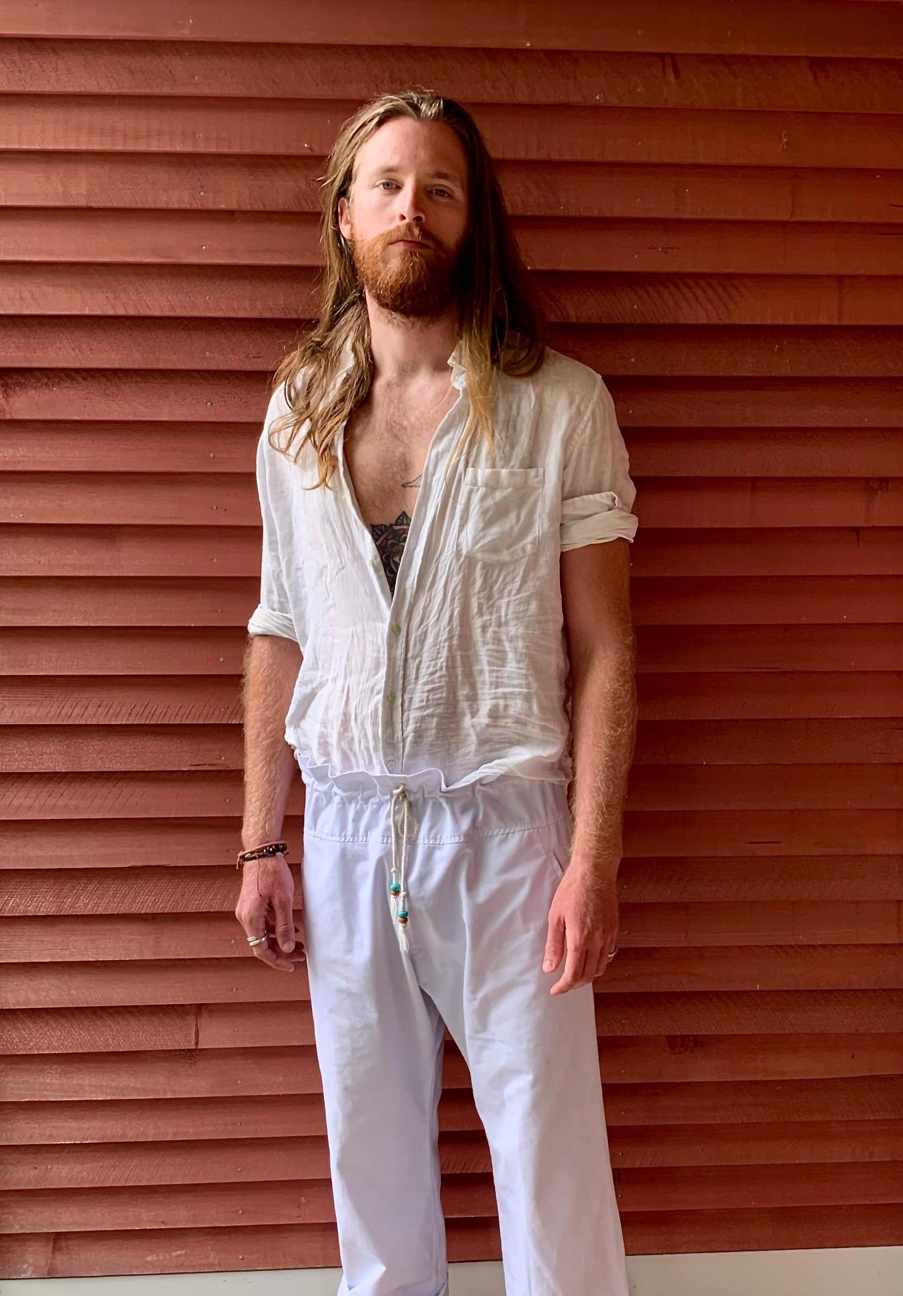 Noble is 6'6" and is wearing White in size 3.