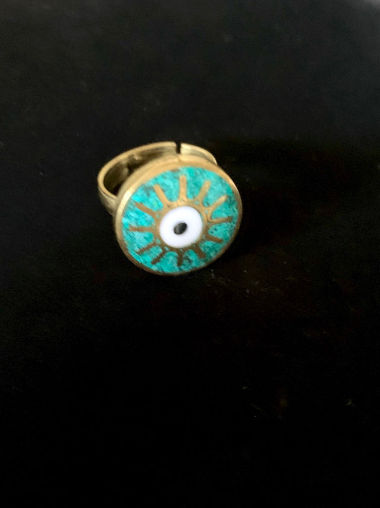 round turquoise and brass evil eye ring
