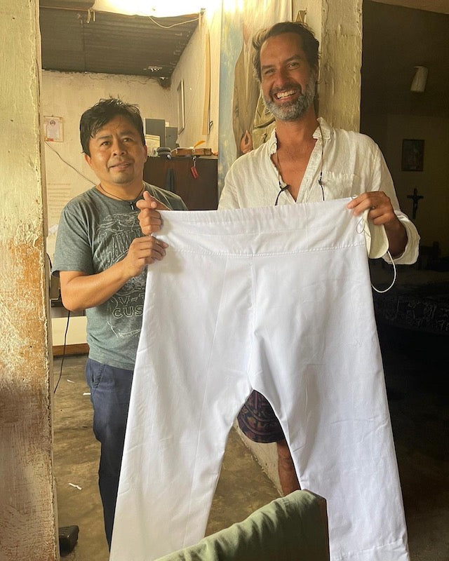 Robert and Francisco with the first sample of the pants! 